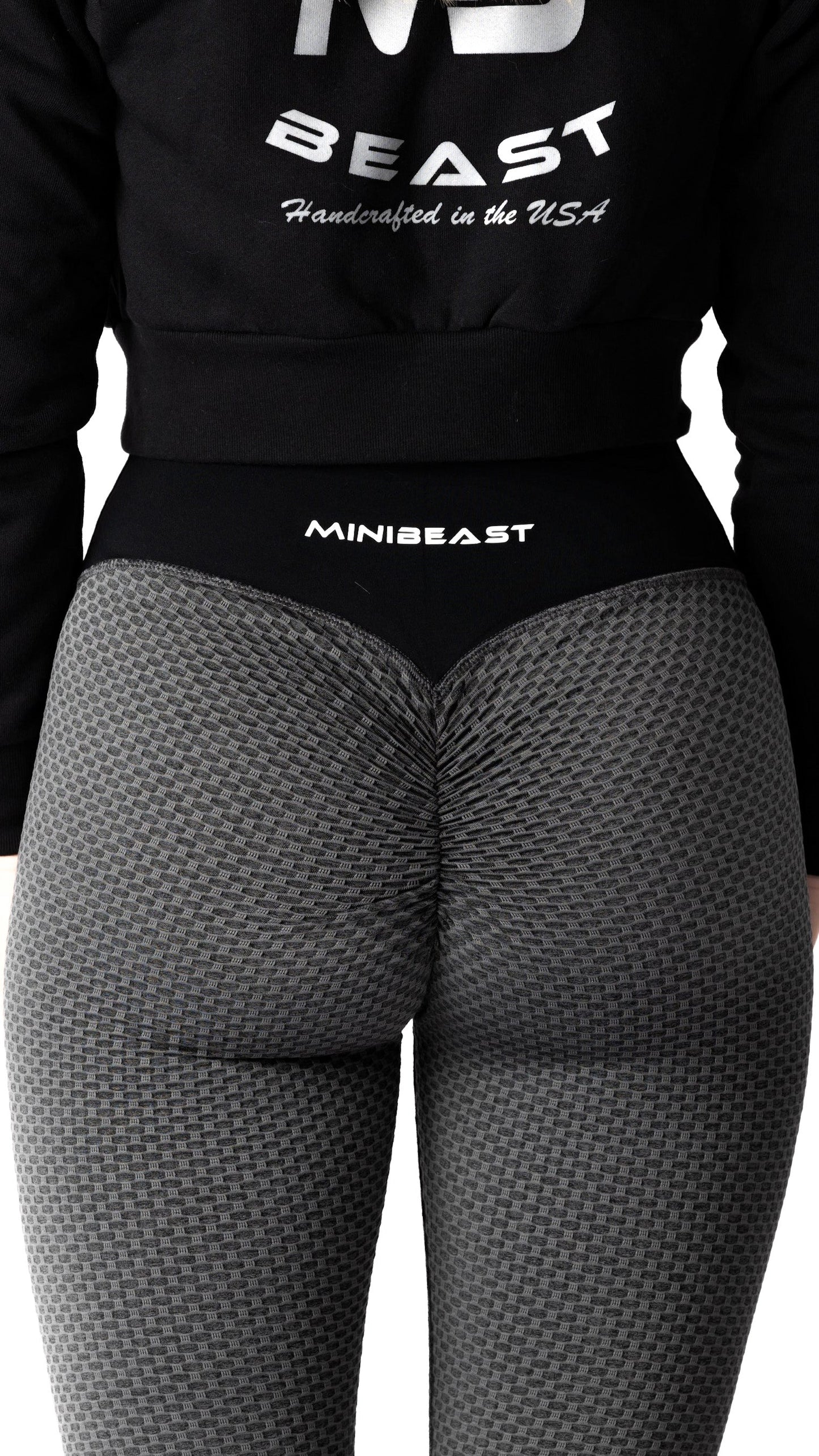 A view of the scrunch booty design on a pair of Curve Classic Leggings in Hex Black. 